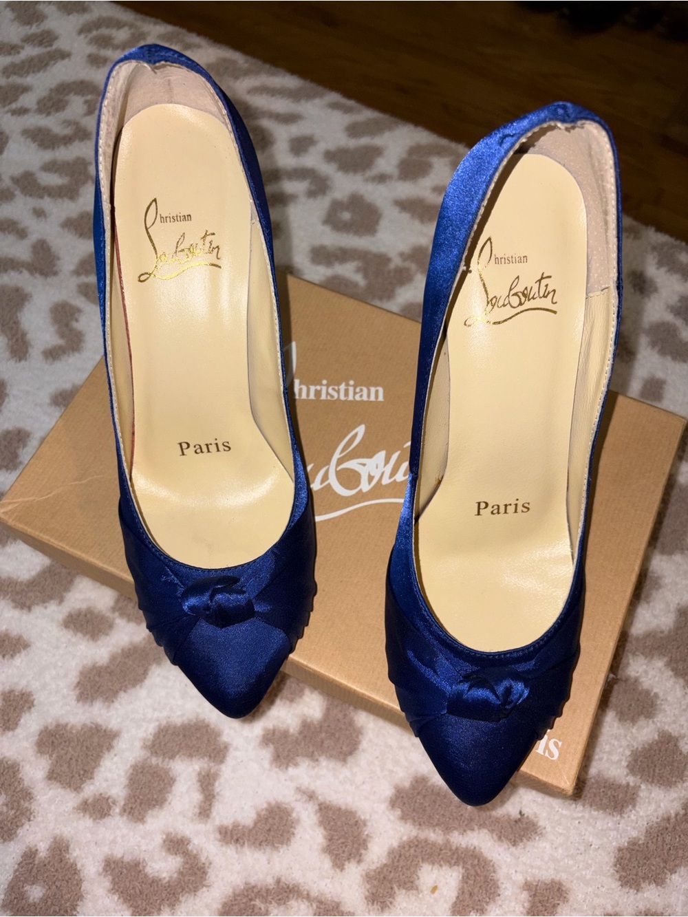 Christian Louboutin Satin Pointed-Toe Pumps in Deep Blue with Knot Detail